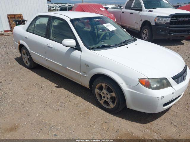  Salvage Mazda Protege